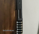 Remington 870 with mag Paul rack, custom stock